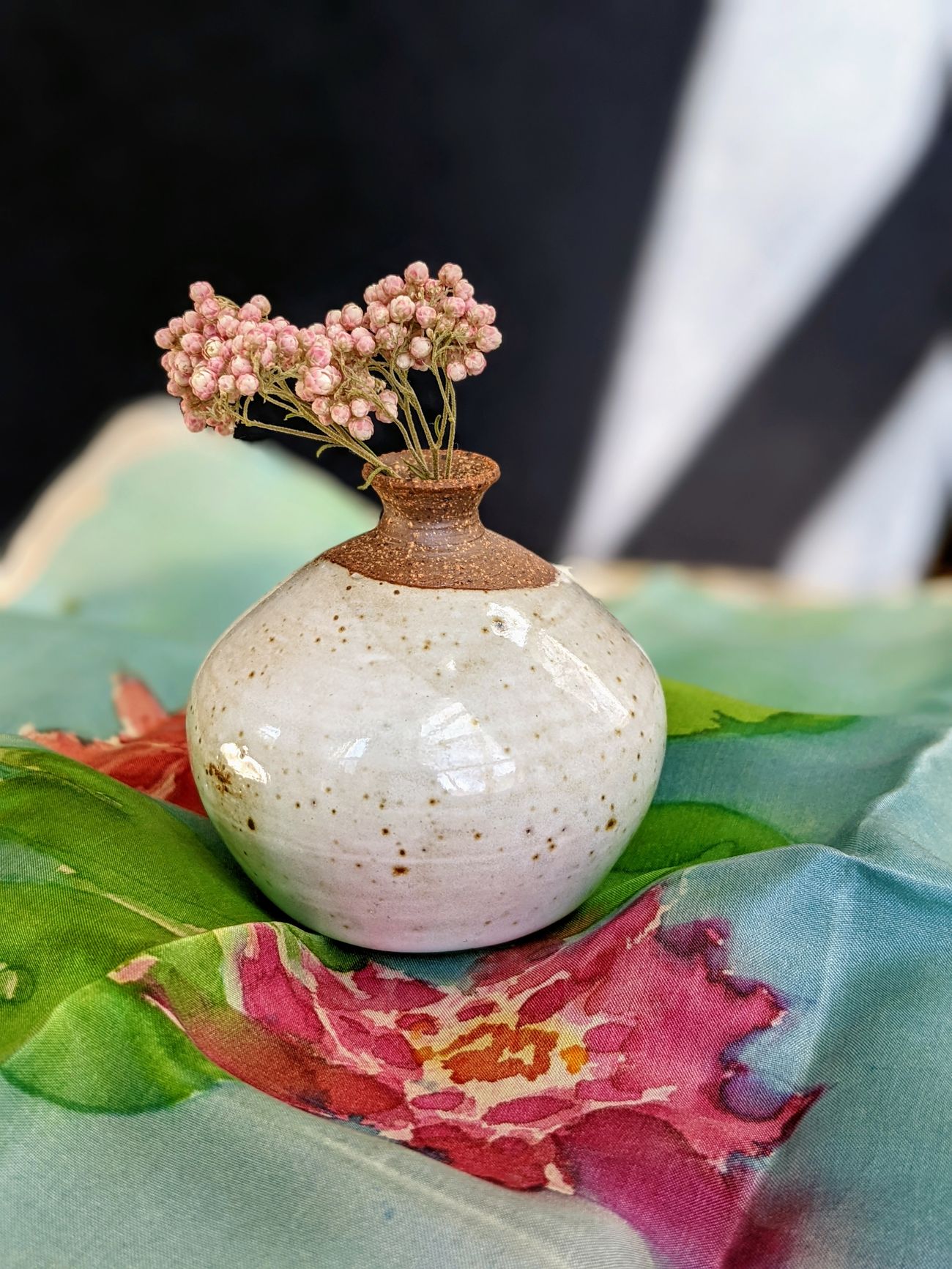 Tiny white bud vase